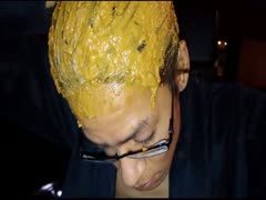 Man using shit as her hair shampoo
